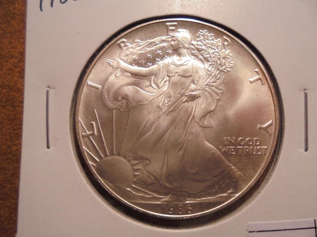1986 AMERICAN SILVER EAGLE UNC (1 of 2)