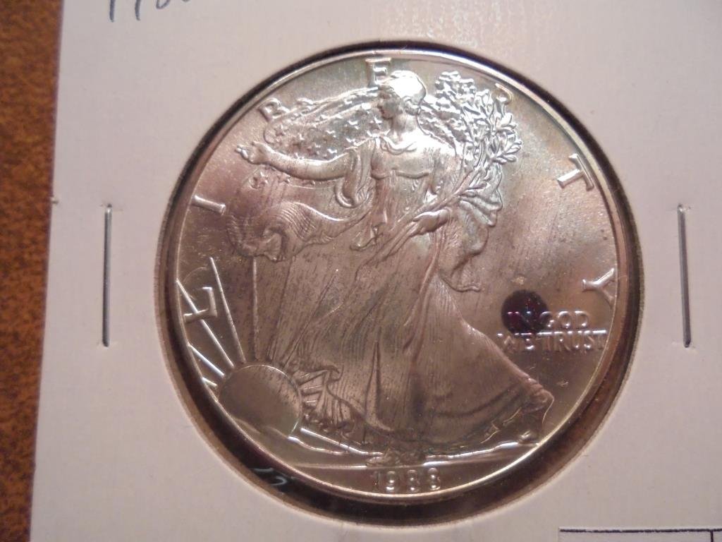 1988 AMERICAN SILVER EAGLE UNC WITH TONING SPOT (1 of 2)