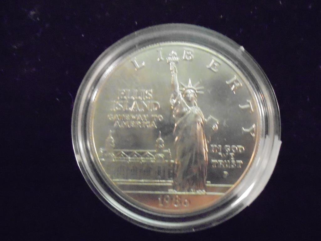 1986-P STATUE OF LIBERTY UNC SILVER DOLLAR: You must call or email us with your credit card number directly