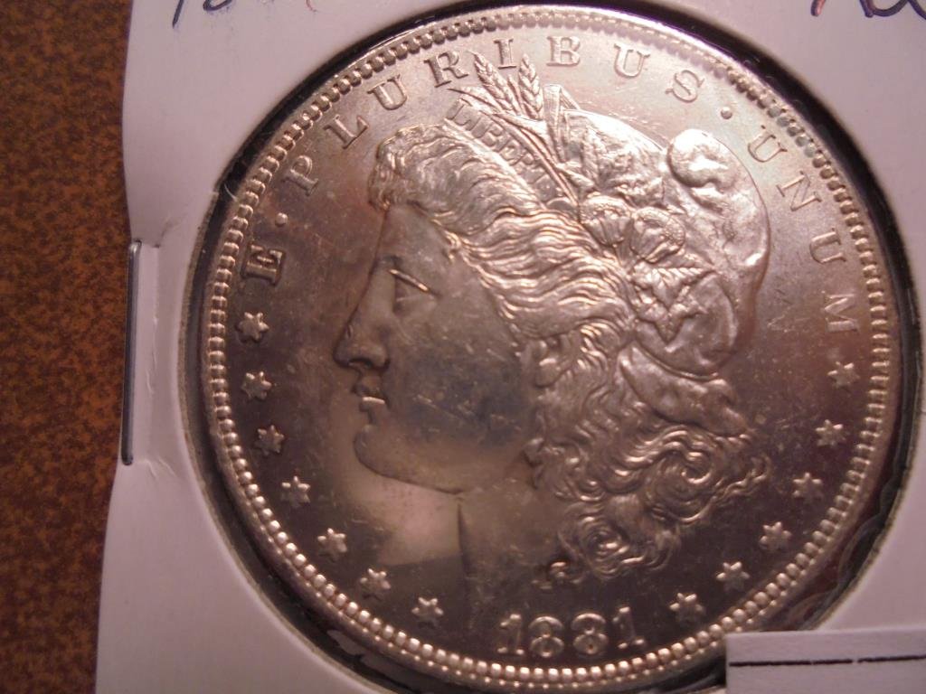 1881-O MORGAN SILVER DOLLAR UNC (1 of 2)
