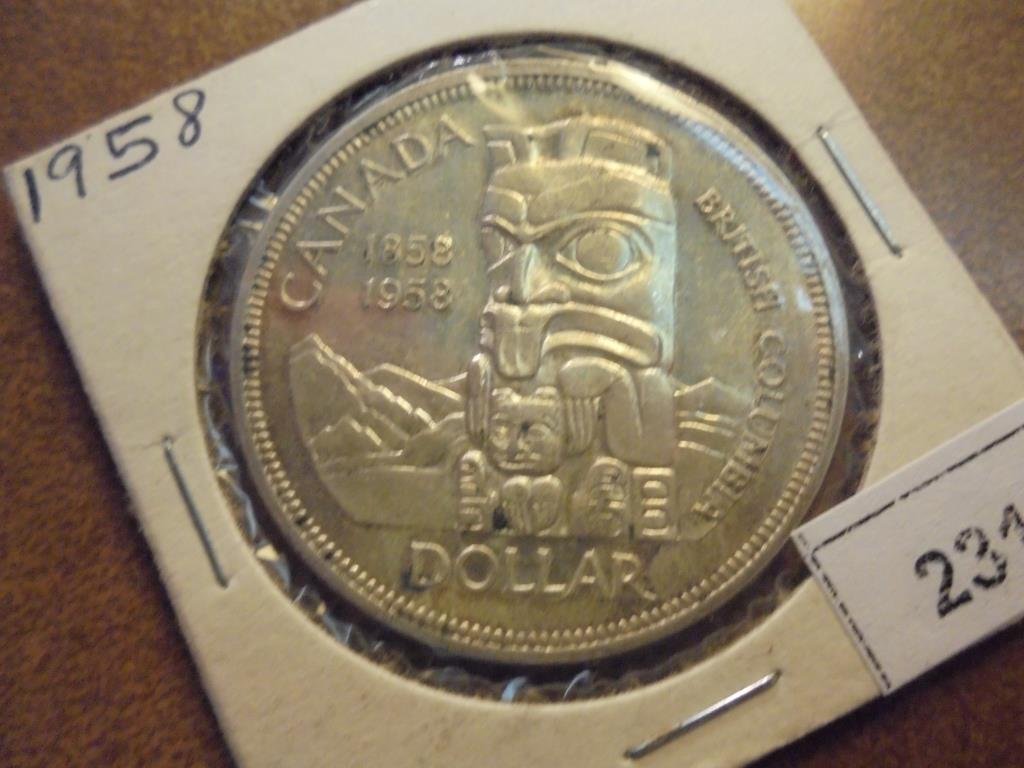1958 CANADA TOTEM SILVER DOLLAR: You must call or email us your credit card directly. Our phone number is 1-763-862-8302 and our email is bidalotauction@aol.com. Thanks.