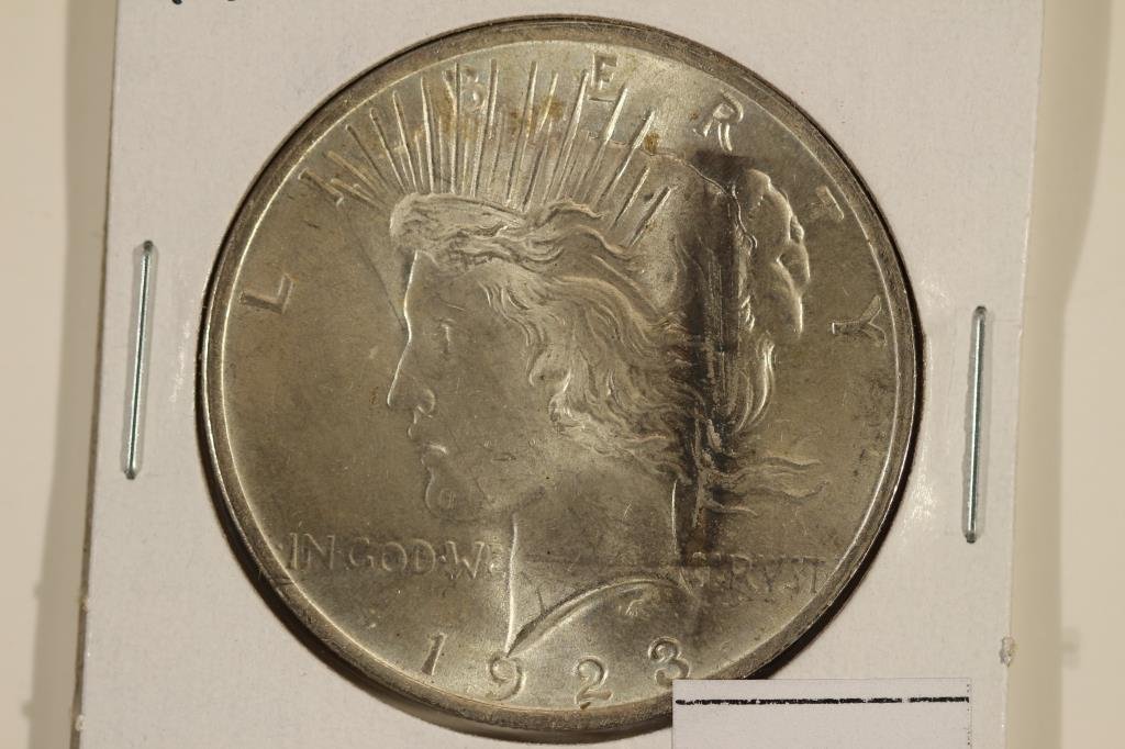 1923 PEACE SILVER DOLLAR UNC WITH TONING (1 of 2)