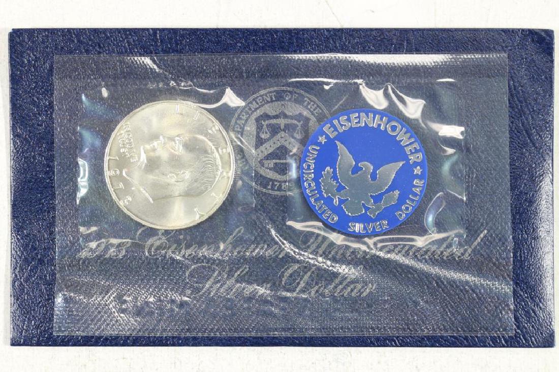 1973  IKE SILVER DOLLAR UNCIRCULATED (BLUE PACK) (1 of 2)