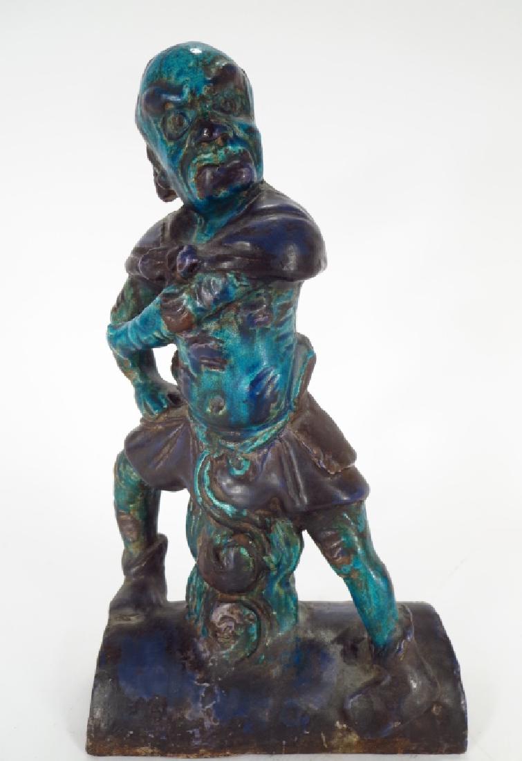 Ming Chinese Roof Tile of a Demon: Chinese Roof Tile with Figure of a Demon, Ming Dynasty, turquoise and aubergine glaze. (SNIG2200){WK} Property Title: From a Private New York City Estate. Measurements: 12.5 H x 7 W x 4.5 D