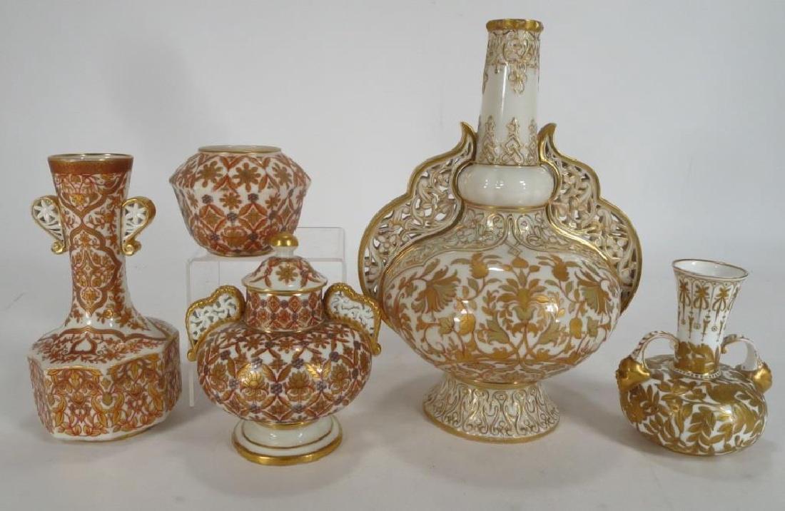 5 Royal Crown Derby Vases,Gilt on White, 19th C: Five Royal Crown Derby Porcelain Vases, late 19th C., with gilt flowers and coral on a white ground; two with reticulated handles.. {QZEIG5218/5} (WK) Dimensions: From 3 - 11 H Provenance: Property fr