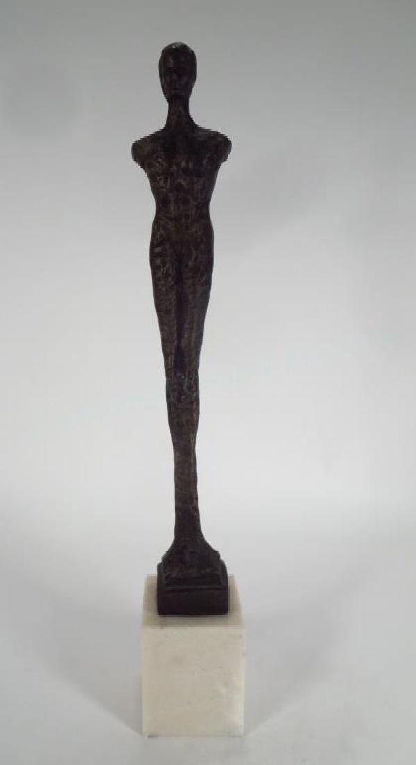 Bronze Sculpture of a Standing Male Nude, 20th C.: Bronze Sculpture of a Standing Male Nude, 20th C.,after German School, on marble base {QYAM5233} (WK) Dimensions: 17 H on 4 H base Provenance: Property from the estate of Jay Yamner in Park Slope, Bro