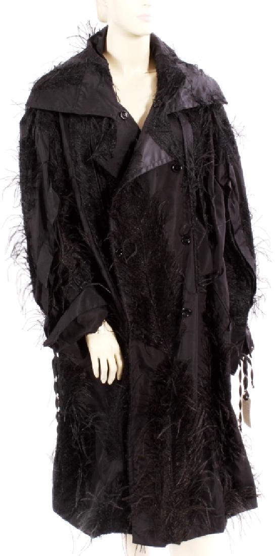 Yves St Laurent Feather & Button Coat: Black silk blend coat by Yves St Laurent - Rive gouche - Made in France. Black feather embroidered all over accent, squared off collar, lace up detail on arm interior, front slip pockets and black but