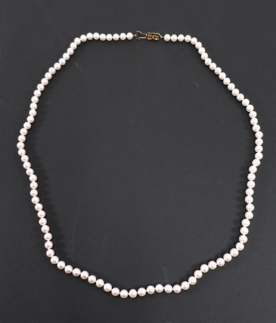 32" Mikimoto Pearls with 18K Gold Clasp: 32" Mikimoto Pearls with 18K Gold Clasp, marked: "750" and "M' monogram, pearls are 7.05 mm to 7.48 mm, includes original box. (JMCK9403) [AC] Dimensions: 32" length