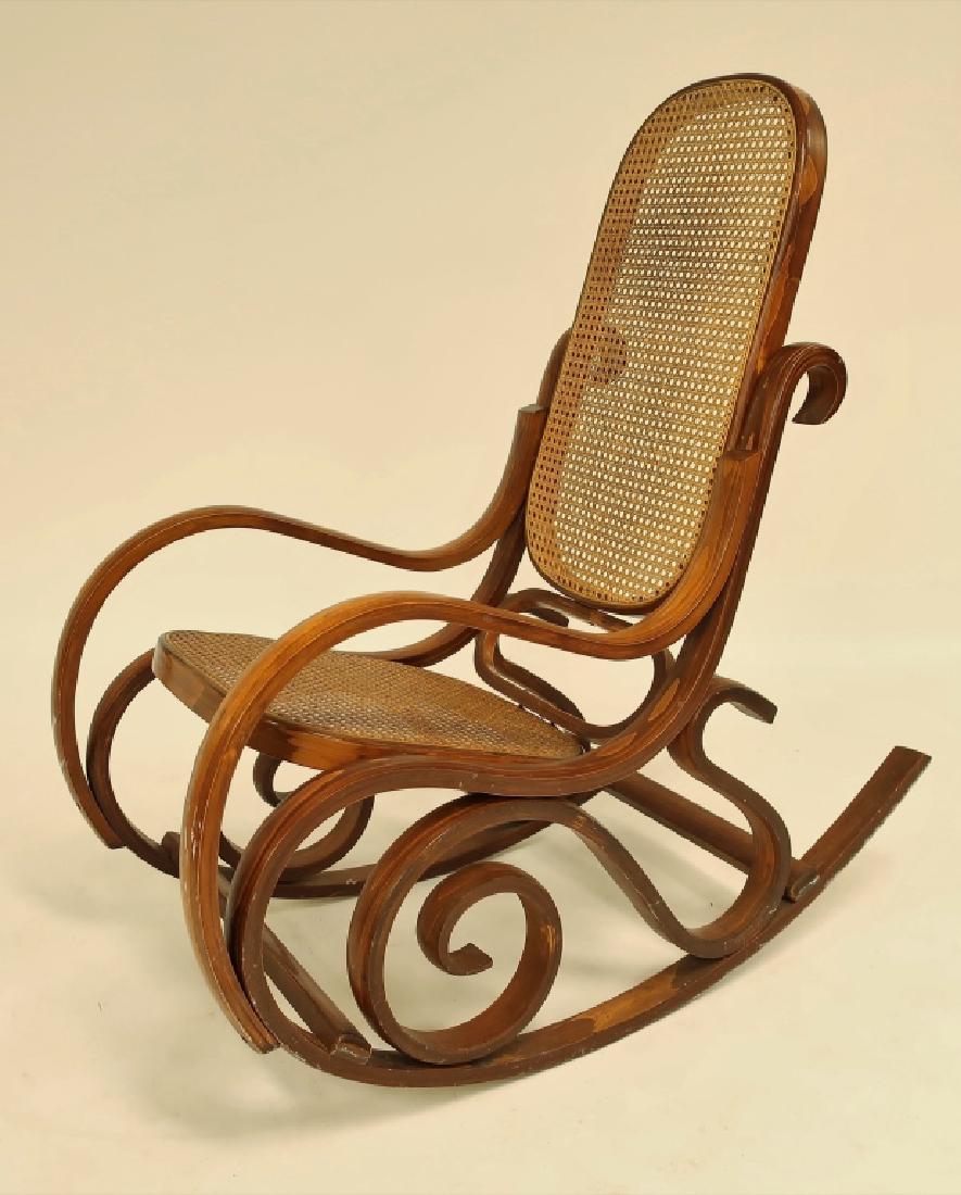 Thonet Style Bentwood/Caned Rocking Chair: Thonet Style Bentwood/Caned Rocking Chair (PBAR1103)[MM] Dimensions: 42"H x 20"W x 42"D Provenance: From a Kent Connecticut Home