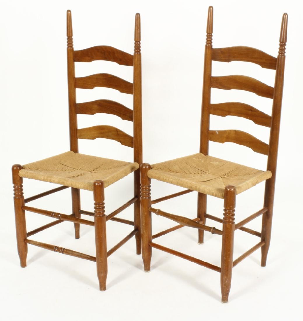 Near pair of Wood/Rush Wavy Ladder Back Chairs: Near pair of Wood/Rush Wavy Ladder Back Chairs, rush seat (STEL2103/2 MM) 41 x 18 x 15 Provenance: From a Manhattan Collector
