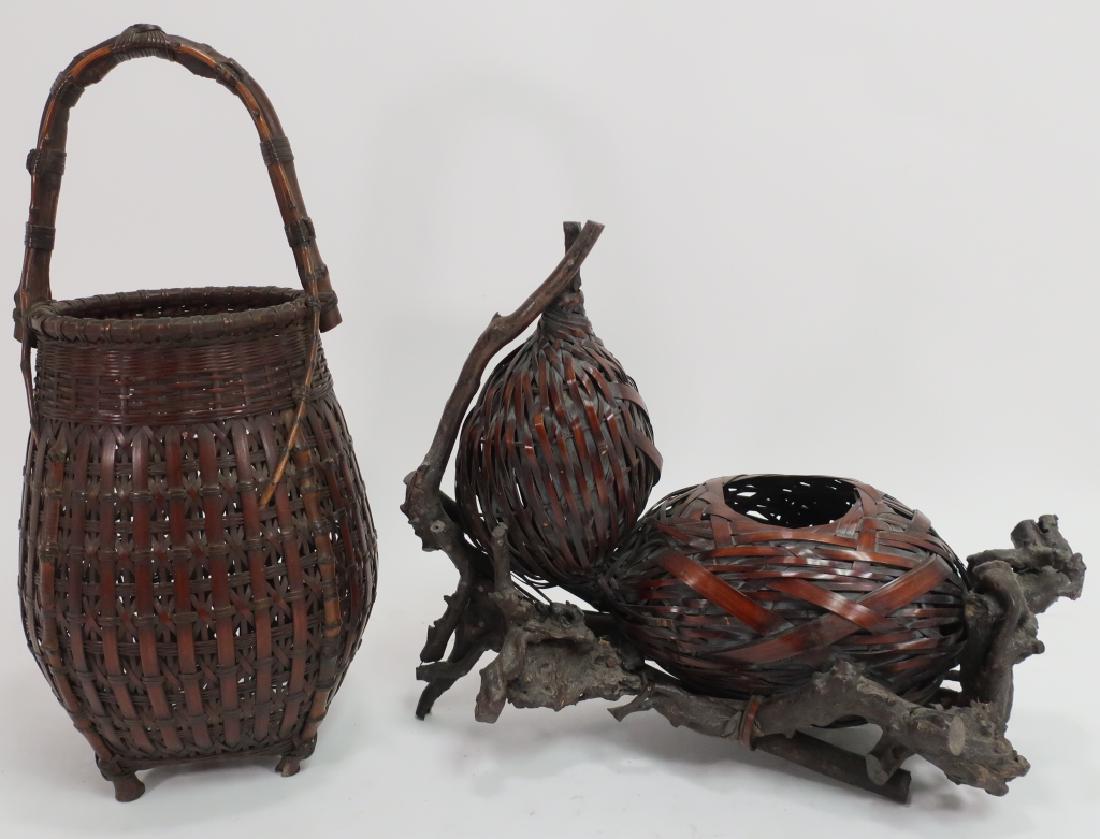 2 Japanese Ikebana Baskets, early 20th C.: Two Japanese Ikebana Baskets for flower arranging,, Japan, early 20th C., one double gourd form, the other ovoid with upright handles, both on integral twig stands. (SMEI3451/2)(WK) Dimensions: Ovoid: