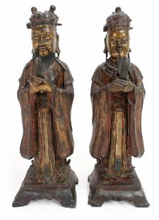 Pair of Chinese Ming Dynasty Bronze Daoists: The lacquered gilt figures holding hu-tablets, traces of polychrome. Note: This item will be available for additional preview at Capsule Gallery in NYC from March 14-21 by appointment only. 618 East