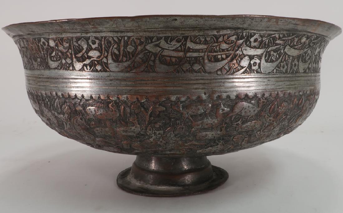 Mughal Indian Copper Bowl w Hunt Scene, 19th C.: Mughal Tinned Copper Bowl, Indian, 19th C., chased with a Hunt Scene and Inscription around the diameter. (AINS3205)(WK) Dimensions: 6.5 H x 14 Dia. Provenance: From a Historic Litchfield Connecticut 