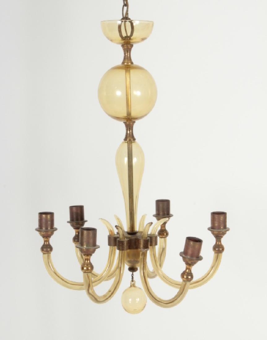 Chandelier Pale Amber Yellow Glass Light Fixture: Chandelier Pale Amber Yellow Glass Light Fixture with six arms and brass fittings. (QSCH3402)(AC) Dimensions: 24" x 16" diameter