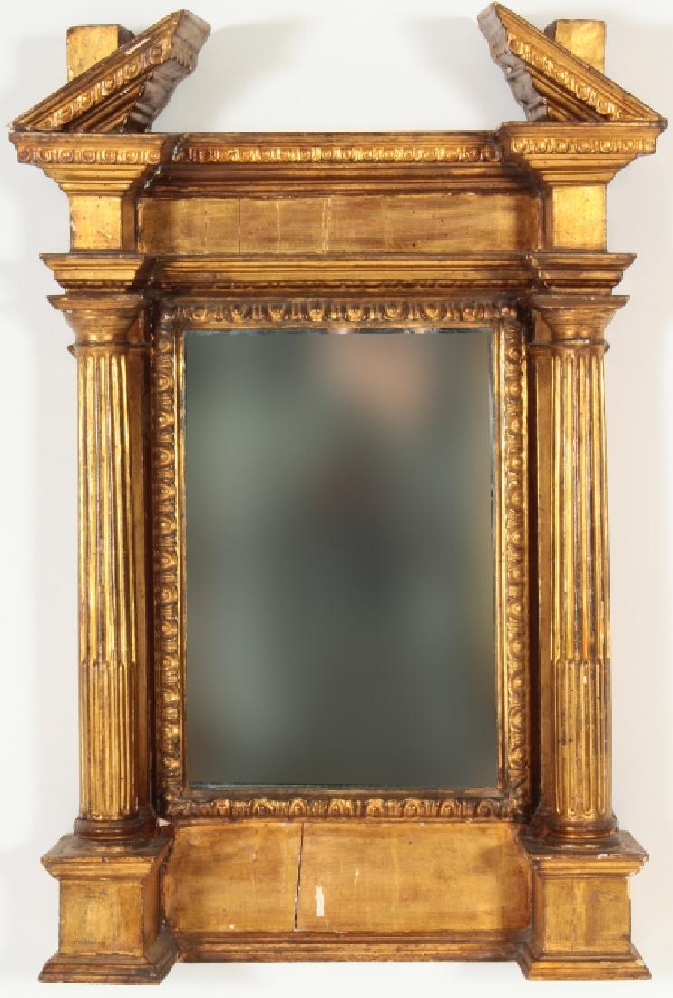 Renaissance Revival Gilt Wood Tabernacle Frame: Renaissance Revival Gilt Wood Tabernacle Frame, broken arch pediment with flanking stop fluted columns, repurposed as mirror (GSHE3112)(MM) Dimensions: 28 x 19 x 5, nside dimensions are 14 5/8" x 10 1