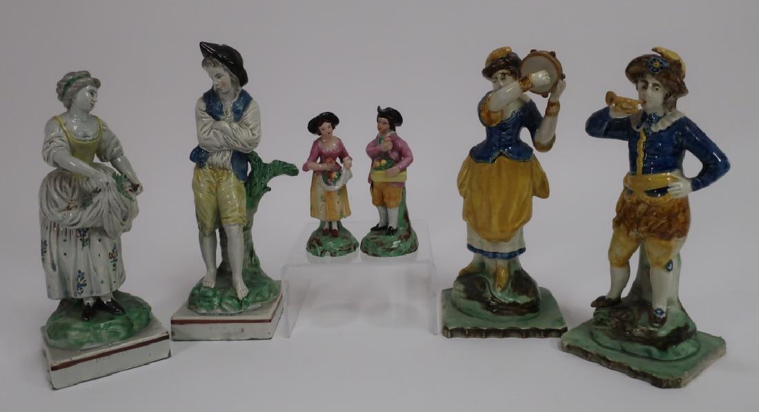 3 Pair of Staffordshire Figures: 3 Pair of Staffordshire Figures, Including: Musicians, a couple with fruit, and a Simon and Iphigenia (6 pcs.) (GSHE3305/6)(PR) Dimensions: Largest: 9 7/8" H Provenance: From the Collection of promine