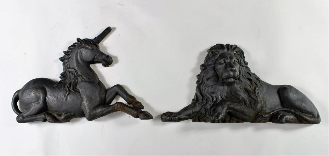 Royal Coat of Arms Cast Iron Lion & Unicorn, 19th: The British Royal Coat of Arms and Order of the Garter Cast Iron Lion and Unicorn, 19th c. English, the lion representing England, the unicorn of Scotland uncommon. Each with a single small hole on th