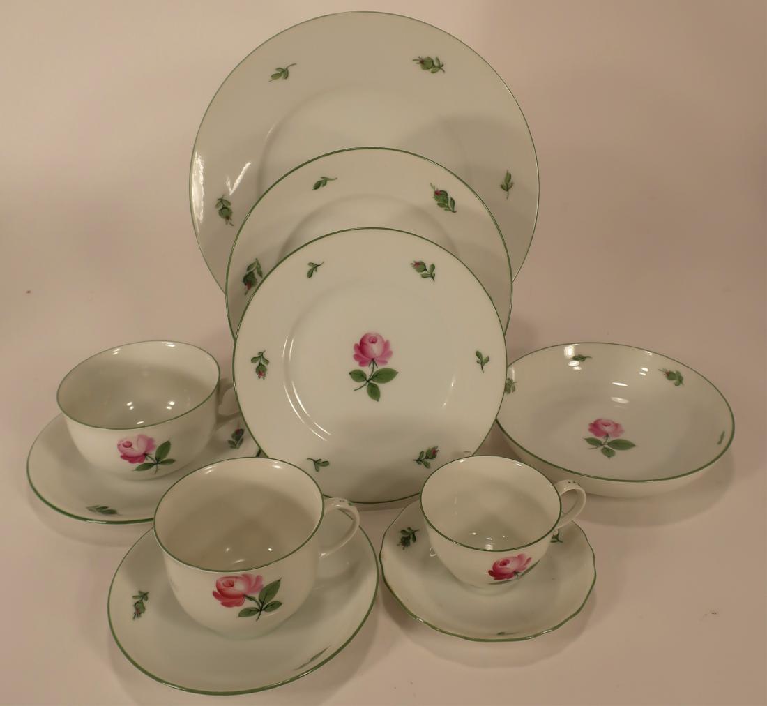 Lot of Augarten Wien Viennese Rose Porcelain: Lot of Augarten Wien Viennese Rose Porcelain, includes 11 dinner,13 medium and 11 small plates, 12 small bowls, 4 large and 12 medium teacups, 1 espresso and 3 demi tasse cups, 12 large, 14 smaller an