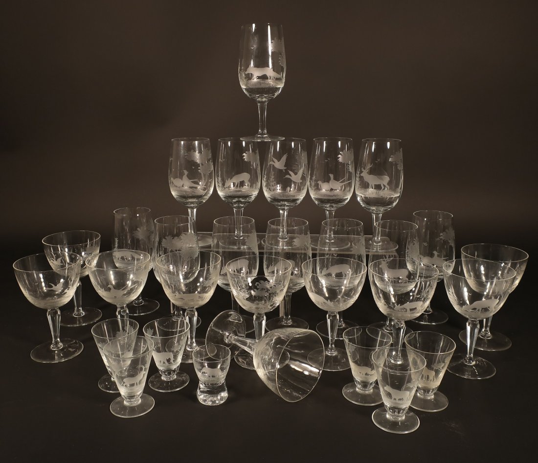 30 Rowland Ward Etched Crystal Pieces: Lot of 30 Rowland Ward Etched Wildlife Crystal Glasses/Stemware, includes 13 white wine, 10 red wine, 6 cordial and one schnapps glass(EBAU5107/30)(MM)Dimensions: Varies from shot glass 2 1/2 x 1 3/4 