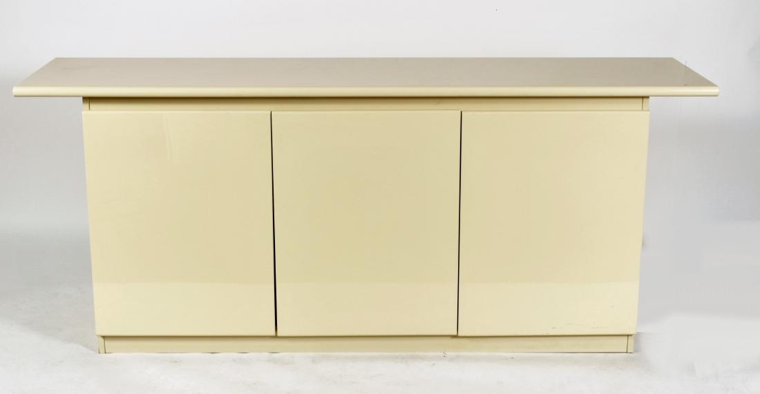 Cidue Italian Cream Lacquered Buffet, c. 1980: An Italian Cream Lacquered Buffet/Sideboard by Cidue c. 1980, the label under the pegged removable top. See 1stDibs for other examples by this maker"(SHYM40XX)(TC)Dimensions: 78" W x 20" D x 32" H