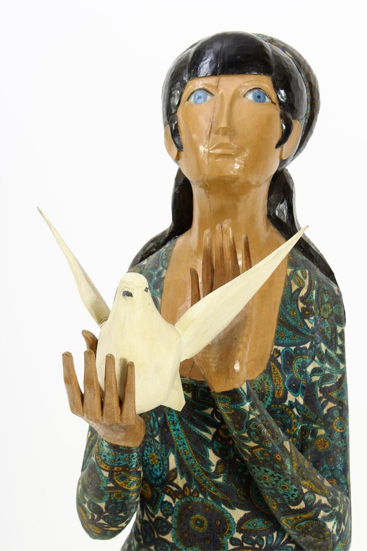 François Brochet, Fr., 1925-2001 "Reine" Sculpture: François Brochet, French, 1925 - 2001, "Reine a l'Oiseau Blanc", (queen with a dove), polychromed carved wood and fabric; titled, dated 1968 and priced $2200 on paper label.(MLEN5005)(TC)Dimensions: