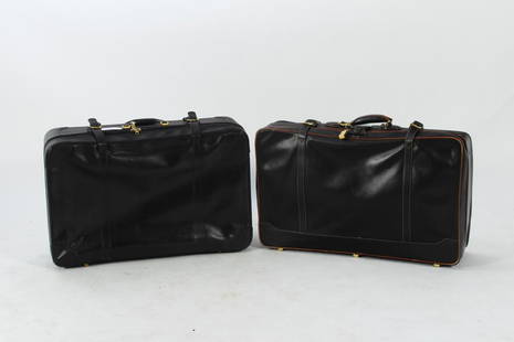 Morabito and Madler Suitcases: Black leather suitcase by Morabito - Paris. Fabric lined interior, zip compartment, belt fasteners, gold tone hardware with single zip and belt closure. Black leather suitcase by Madler. Paisley fabri