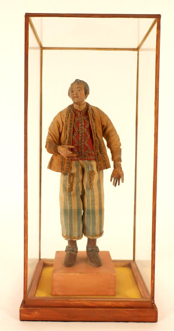 Italian Opera Creche Beggar, Carved and Painted: Italian Hand-carved and Painted Wooden and Fabric Opera or Creche Beggar, in the manner of Giuseppe Sanmartino (1720-1793), cased, unmarked [QKAT7004] (TC) Dimensions: the figure 8.5" H, glued to a on