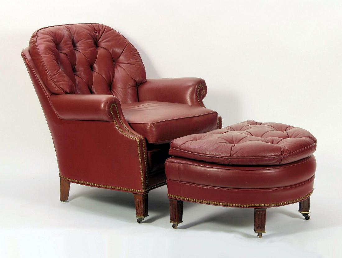 Oxblood Leather Club Chair and Ottoman, Hancock...: Oxblood Leather Club Chair and Matching Ottoman, tufted back, rolled arms, brass tacked with brass casters, manufactured by Hancock & Moore, North Carolina [VCOU7000] (TC) Dimensions: Chair 32"W × 33