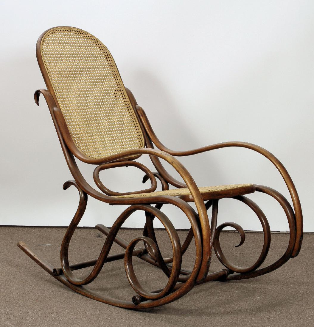 Bentwood and Cane Rocking Chair: Bentwood and cane rocking chair. [QKAT7332] (PR) Dimensions: 41.5" high Provenance: from a Katonah, New York Estate