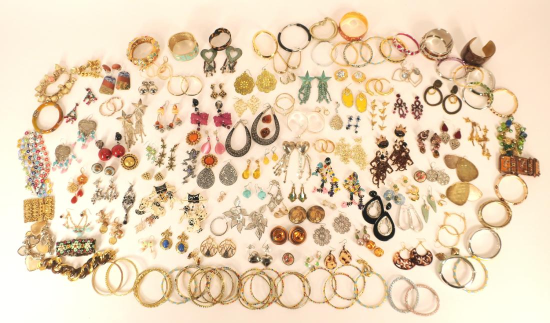 Large Lot of Costume Earrings and Bracelets: Pierced and clip earrings. Enameled bangles and other bracelets. Some signed. (50SUT1421/LOT) (KR/EL) NOTE: All jewelry lots must be paid by wire tansfer. Dimensions: Various.