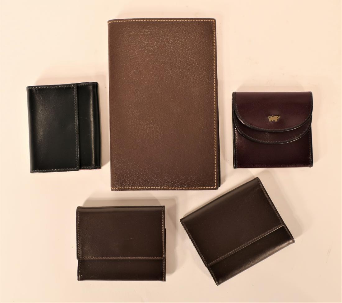 Mark Cross Leather Items: Brown pebble leather billfold, two brown coin purses, one black coin purse by Mark Cross along with a brown small bill/coin purse by Brown Buffel. (LLOW1312/5) (KR) Dimensions: Billfold 4.5" x 7"