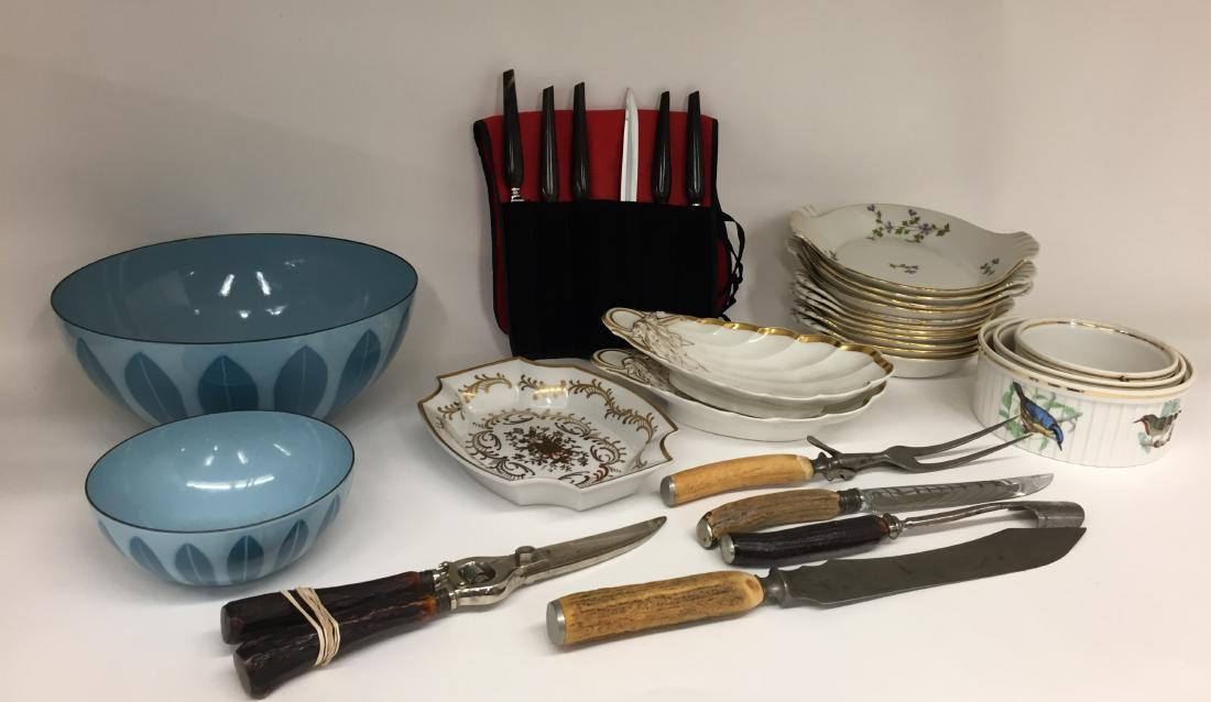Kitchen Accessories Lot: Round, graduated casseroles Le Faune, France; two handled scallop dishes, vine/sprig decoration, France; Solingen steak knives in wrap; horn handled carving knives and meat fork and cheese scoop, etc.