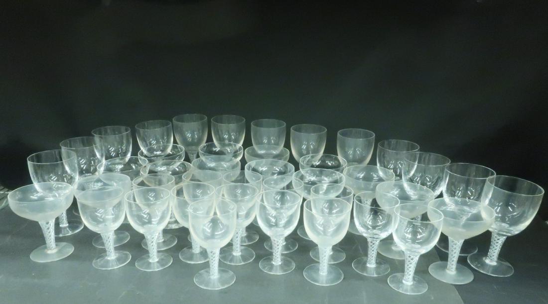 41 Pieces Stuart Clear Glass Stemware: 13 Large Goblets/Red Wines; 14 White Wine & 14 Champagnes, air twist stems Dimensions: 6" H x 3 1/4" Dia.; 5" H x 2 3/4" Dia.; 4 3/4" H x 4" Dia. (QGMAL25-289/41) (WT)