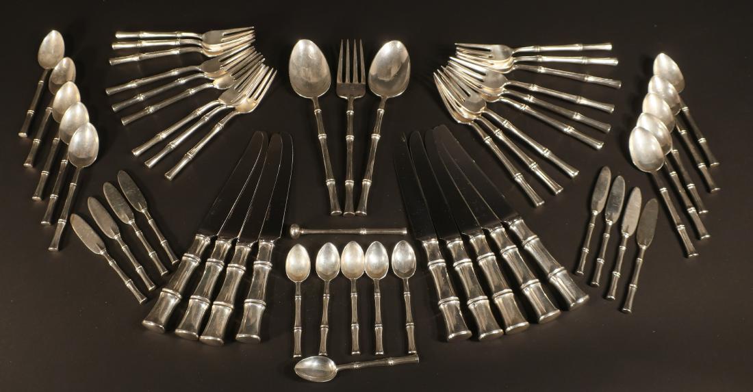Tiffany & Co. Sterling Flatware Service, Bamboo: In the Bamboo pattern, Comprising: 9 dinner knives, 9 dinner forks, 9 salad forks, 10 teaspoons, 6 demitasse spoons, 8 butter spreaders, 1 old fashion cocktail muddler, 2 serving spoons and 1 serving