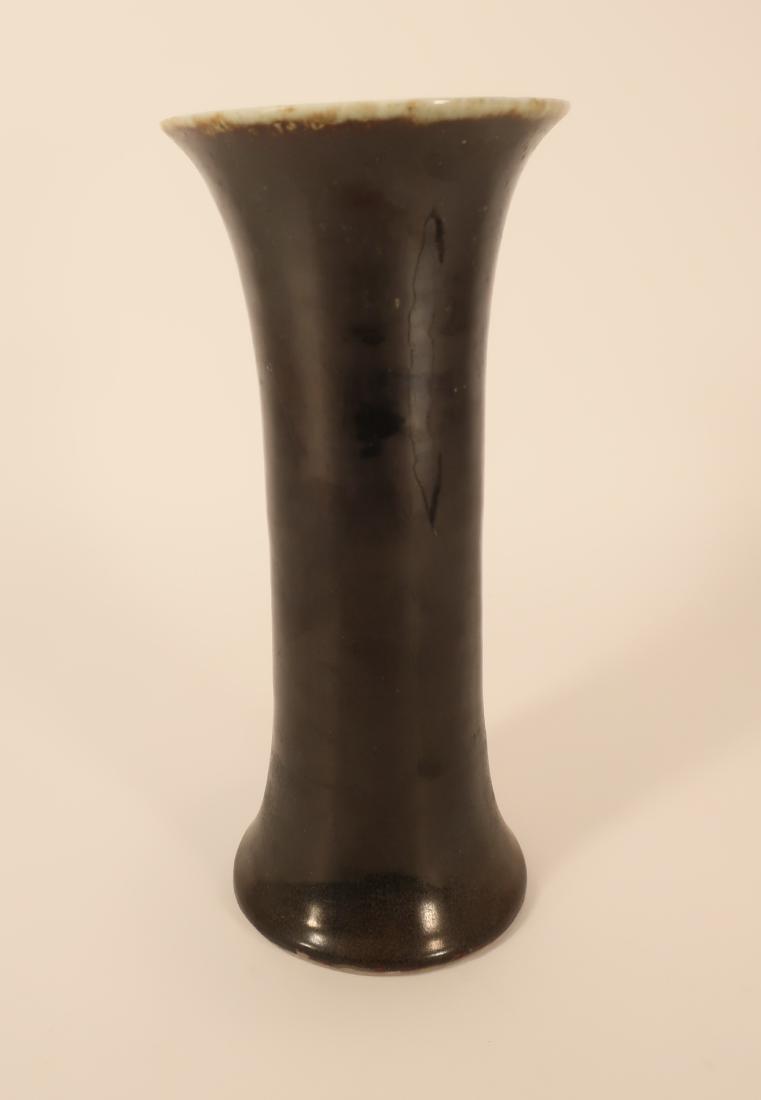 Chinese Porcelain Vase: Black glaze with averted rim Dimensions: 11 1/4" H x 5" Dia. Property Title: The Collection of Arthur & Lillian Weiss, Little Deer Isle, Maine (LDI35-681) (WT)