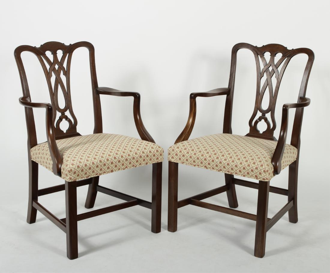Pair of Vintage George III-Style Open Armchairs: Pair of Vintage George III-Style Open Armchairs, mahogany, with stretchers, open splats and ornate crests. Dimensions: 24" W x 38" H at crest, 21" D, seat 19" H (BDIC3000/2) (TC)