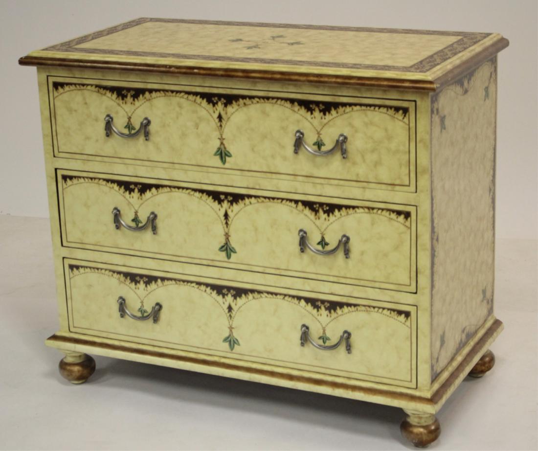 Painted Chest: Cream color with leaf and flower decoration. DIMENSIONS: 32" H x 38" L x 19" W We encourage all bidders to obtain shipping quotes before placing bids. (BMIL45-24) (WT)