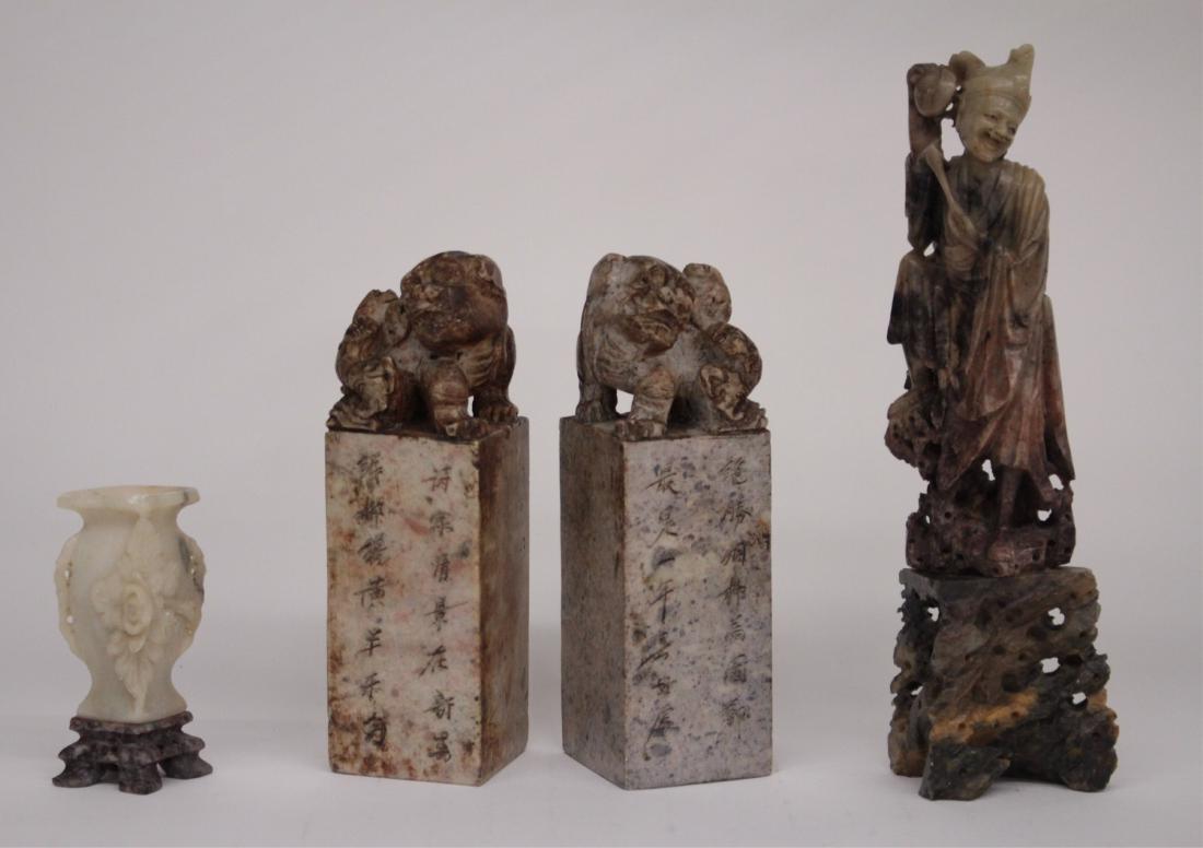 4 Chinese Soapstone Pieces: Pair of Chops with Calligraphy, standing male figure and a small vase DIMENSIONS: Smallest: 4" H x 2" W; Largest: 10 1/4" H x 3" W We encourage all bidders to obtain shipping quotes before placing bid