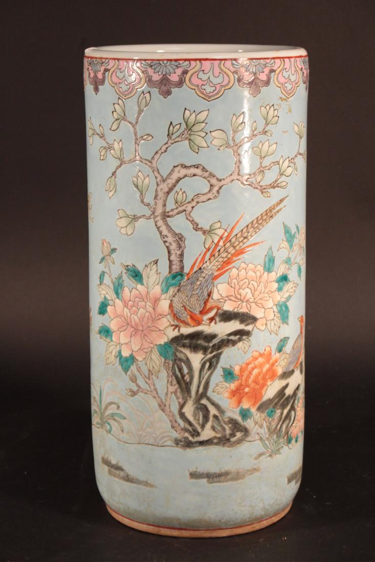 Asian Ceramic Umbrella Stand: Colorful birds and flowers on a blue ground DIMENSIONS: 18" H x 8 1/2" Dia. We encourage all bidders to obtain shipping quotes before placing bids. (TCRE45-135) (WT)