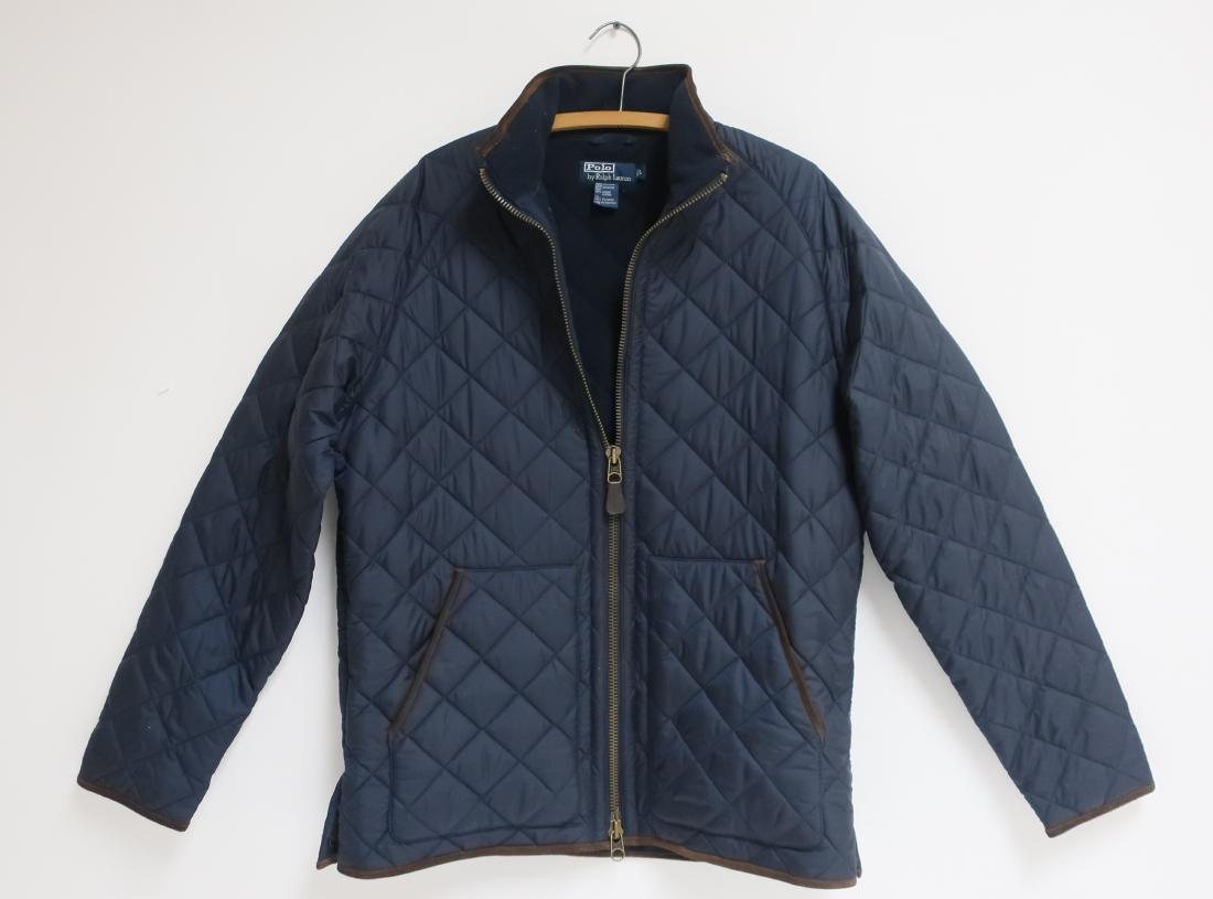 Polo by Ralph Lauren Jacket: Blue quilted with leather piping, polyester shell and lining. DIMENSIONS: Size Mens Large We encourage all bidders to obtain shipping quotes before placing bids. (TCRE45-172) (WT)