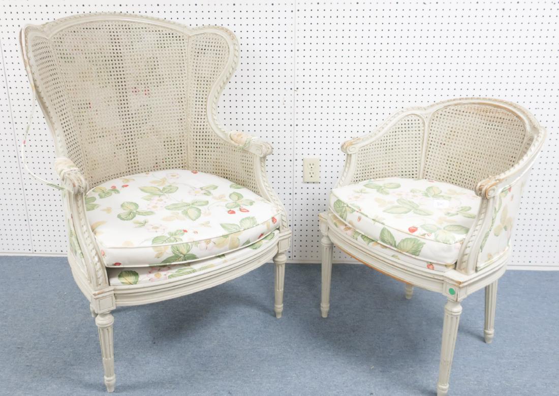 Two Louis XV-Style Gray Painted and Caned Bergeres: Two Vintage Louis XV-Style Gray Painted and Caned Bergeres, a low back and a high scalloped fan back, each with matching vinyl cushions for sunroom use. DIMENSIONS: each seat 20" H We encourage all b