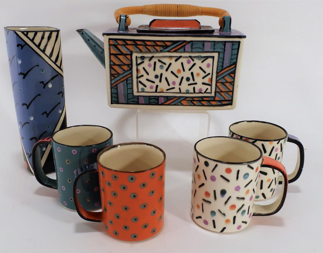 Dorothy Hafner, American b. 1952. Ceramic Set: All signed on bottom. DIMENSIONS: Vase: 8" to handle. We encourage all bidders to obtain shipping quotes before placing bids. (NN4-248) ()