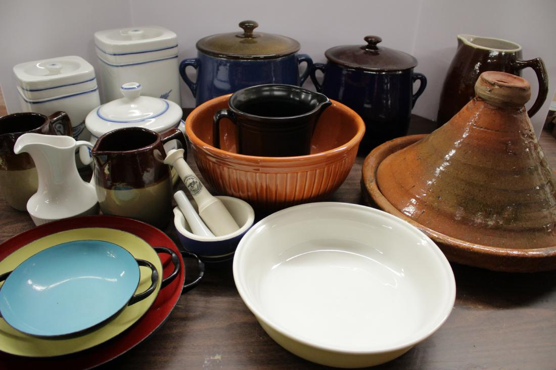 Kitchen Collection: Cookware, Serving Items: Ceramics, canisters,pitchers, mixing bowls, round covered casseroles, graduated enameled servers (France),petite juicer, tagine ceramic cooker, etc. . Approx.19 pcs. DIMENSIONS: Tallest canister 8". L