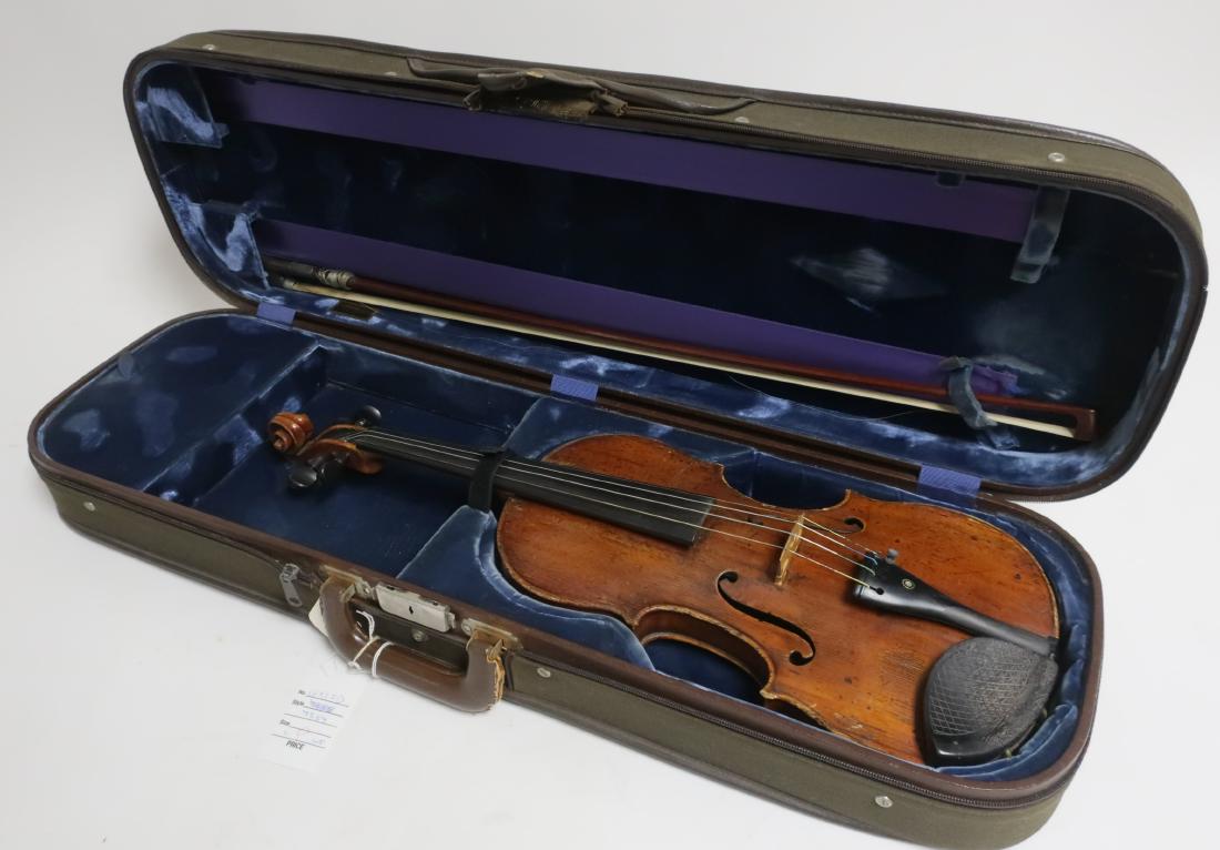 Violin & Bow, Julius Heinrich Zimmerman: Violin & Bow, violin marked #9, 1909 and initialed JHZ for Julius Heinrich Zimmerman. Tiger Maple back, possibly pine front. The bow is unmarked with case. DIMENSIONS: 23.5 by 8 and bow 29 l. We encou