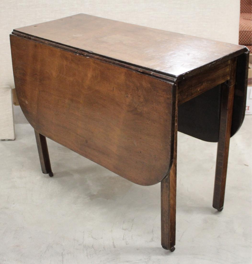 Antique Drop Leaf Table: Antique Drop Leaf Table DIMENSIONS: 29 x 36 x 18 We encourage all bidders to obtain shipping quotes before placing bids. (TWAL2246) (MM)