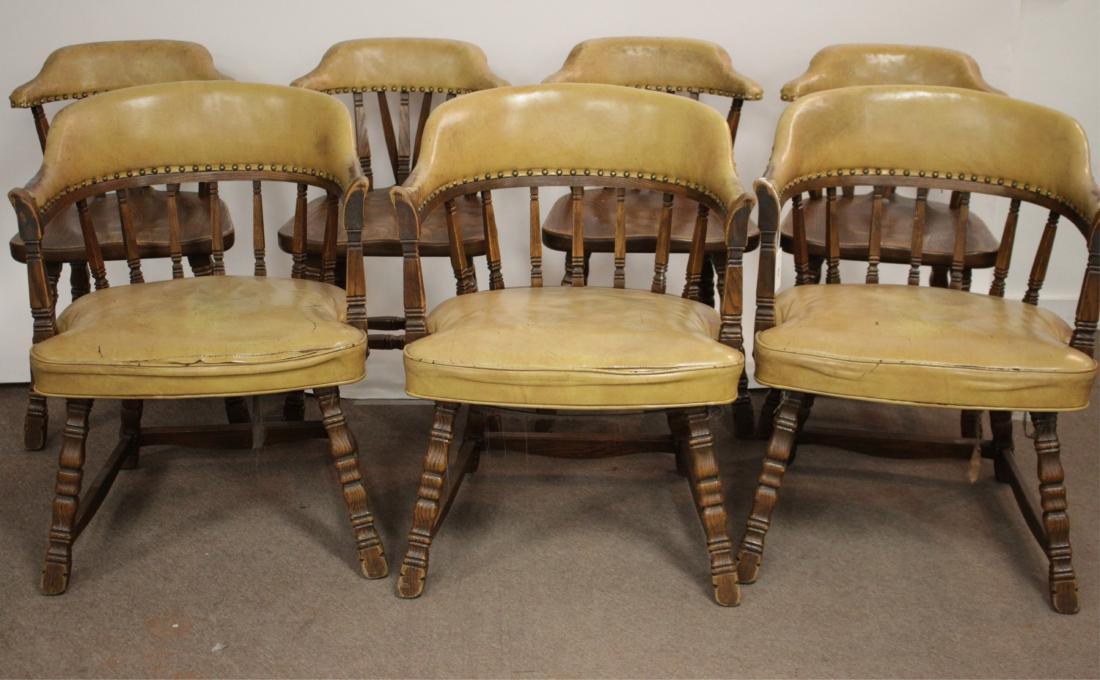 Set of 7 Romweber Viking Oak Dining Chairs: Partial stamp "Viking Oak" DIMENSIONS: Arms: 31" H x 24" W; Sides: 30" H x 18" W We encourage all bidders to obtain shipping quotes before placing bids. (CHEF2-53/7) (WT)