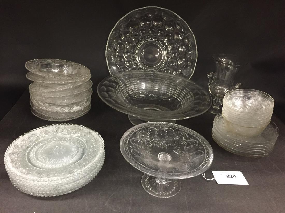 Assorted Glass Lot: Heisey platter, 8 cut glass finger bowls & under plates, similar pedestal dish, large cut glass bowl, 8 pressed glass soup plates & 6 matching salad plates, blow & applied vase. (34 pcs) DIMENSIONS: L