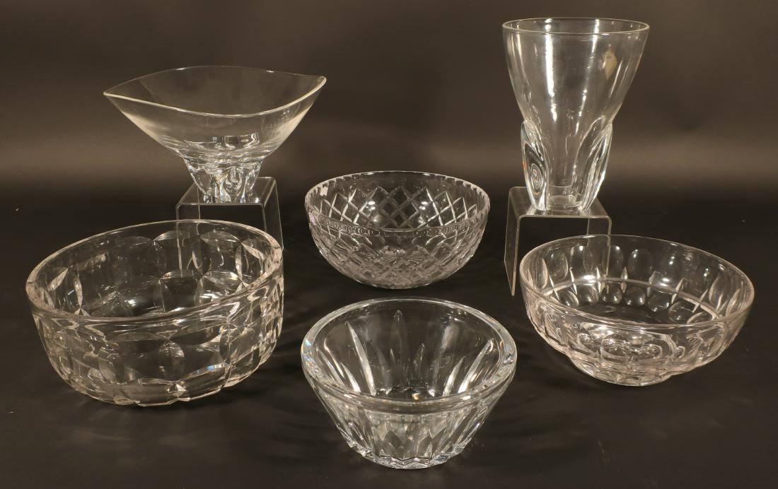 Cartier Baccarat Stuart Steuben Royal Brierley Lot: (6) pieces, all marked. Cartier bowl; 8.75d by 4h. Baccarat bowl; 6.75d by 3.5h. Stuart bowl; 8d by 3.75h. Steuben bowl; 10d by 5h. Steuben vase; 8h by 6d. Royal Brierley; 9d by 4h. DIMENSIONS: as det