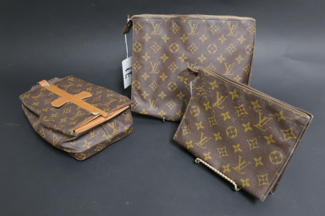 Vintage Louis Vuitton Toiletry Pouches/Bag: Vintage Louis Vuitton Luggage Accessories includes, zipper closure Pouches with Saks Fifth Avenue retail logo, pop up toiletry bag unmarked DIMENSIONS: Bag 3 1/2"H x 9 1/2"W x 5"D, Folios 6 x 7 and 8 