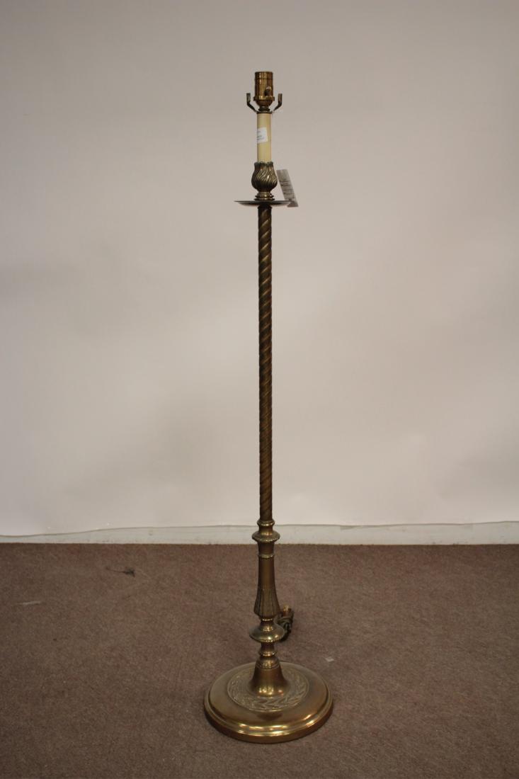 Vintage Brass Floor Lamp: Base with band of leaf and berry decoration, incised spiral standard, flame or flower bud form top with bobeche plate and candle sleeve, socket atop, brass ball switch. 47.5"H to top of candle sleeve 